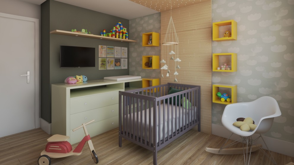 Ejemplo de dormitorio infantil de 1 a 3 años contemporáneo de tamaño medio con paredes multicolor y suelo de madera clara