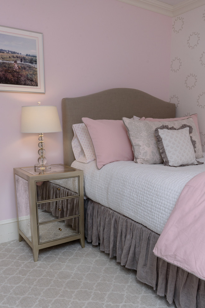 Mid-sized transitional girl carpeted kids' room photo in New York with pink walls
