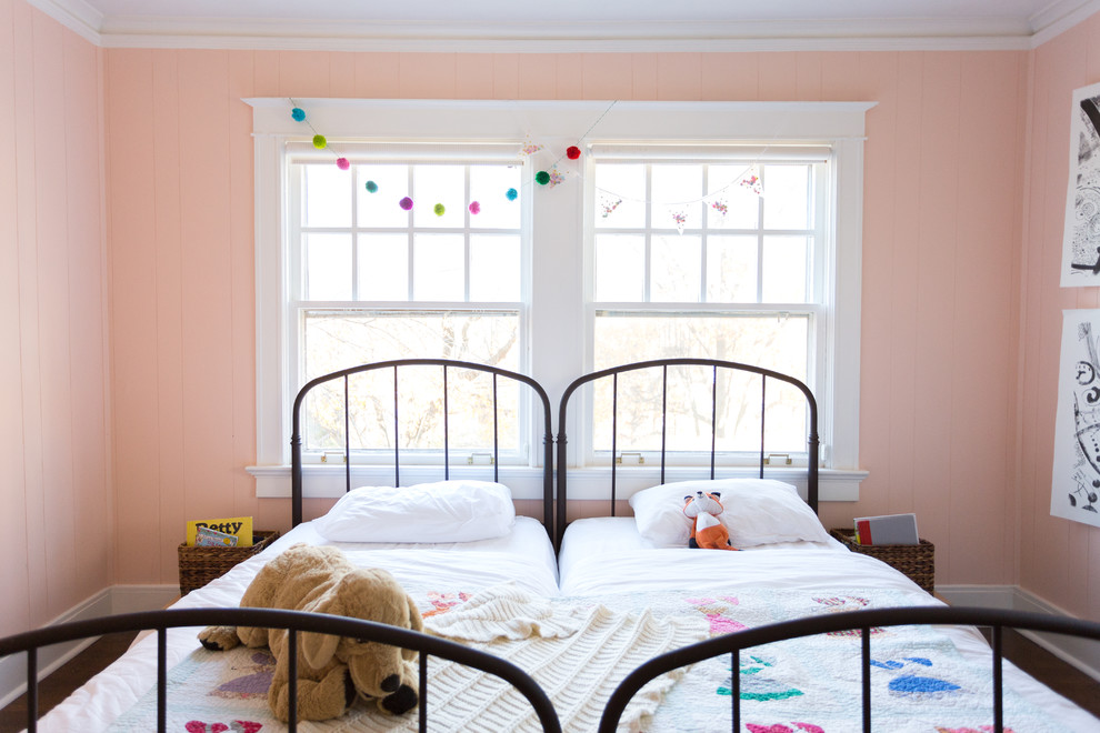 Inspiration for a medium sized country kids' bedroom for girls in Kansas City with pink walls.