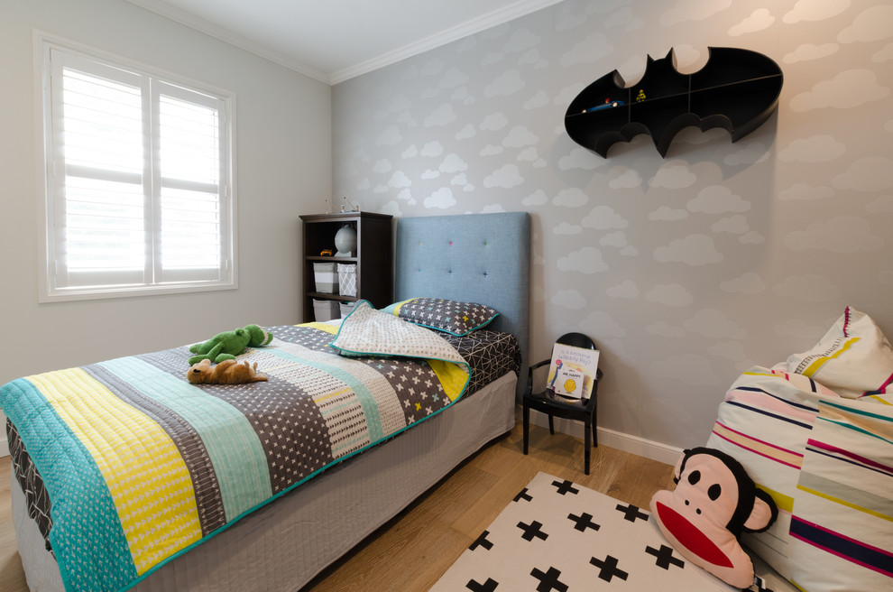 Inspiration for a medium sized contemporary kids' bedroom in Sydney with white walls and light hardwood flooring.