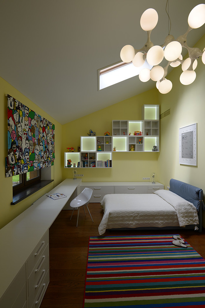 Kids' room - mid-sized contemporary boy medium tone wood floor kids' room idea in Novosibirsk with yellow walls