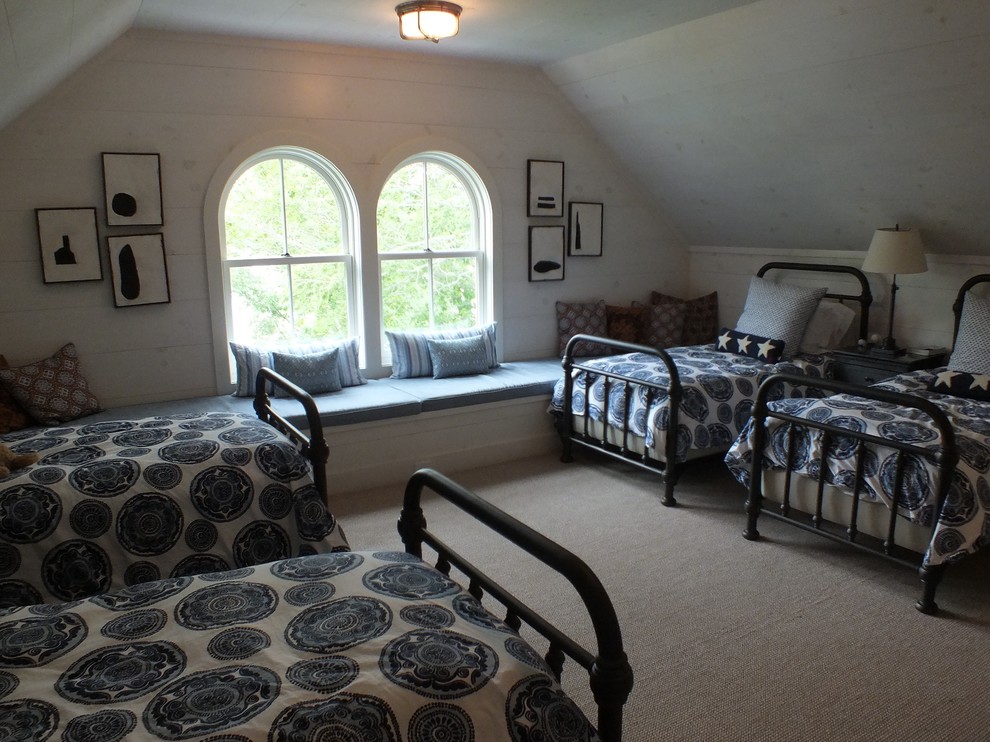 Large traditional teen’s room for boys in New York with white walls and carpet.