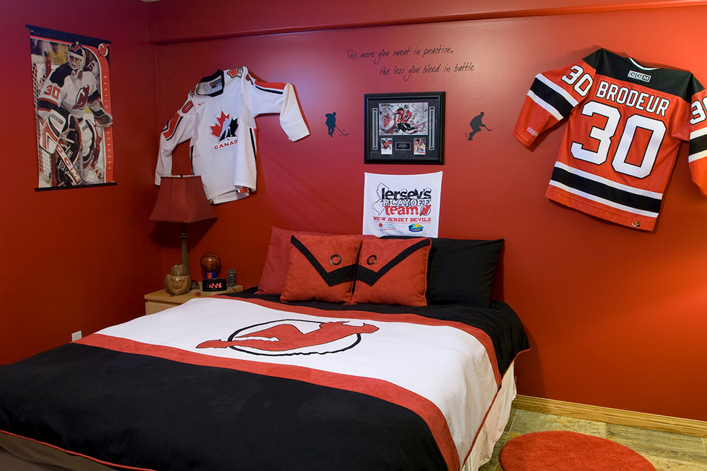 Photo of a medium sized contemporary teen’s room for boys in Calgary with orange walls and travertine flooring.