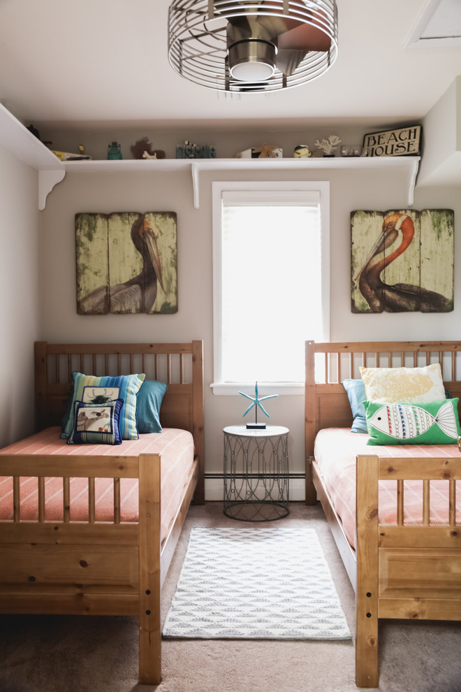Example of a small beach style gender-neutral carpeted and brown floor kids' room design in Other with gray walls