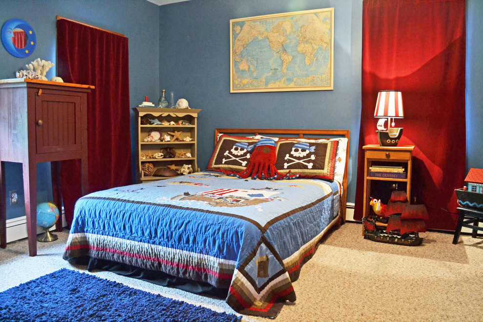 Eclectic children’s room for boys in New York with blue walls and carpet.