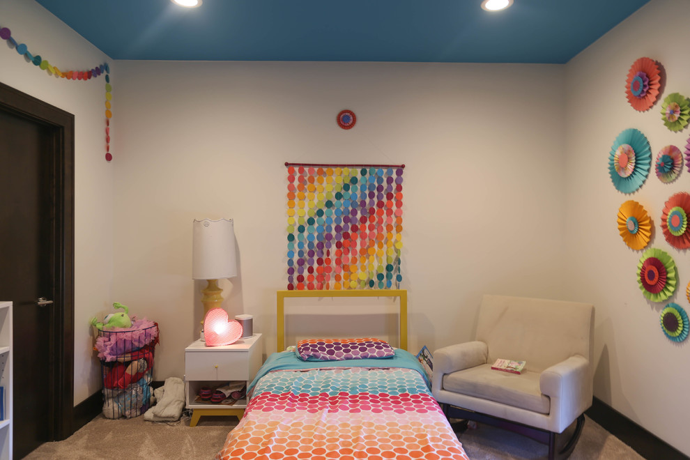 Inspiration for a large transitional girl carpeted and beige floor kids' room remodel in Other with multicolored walls