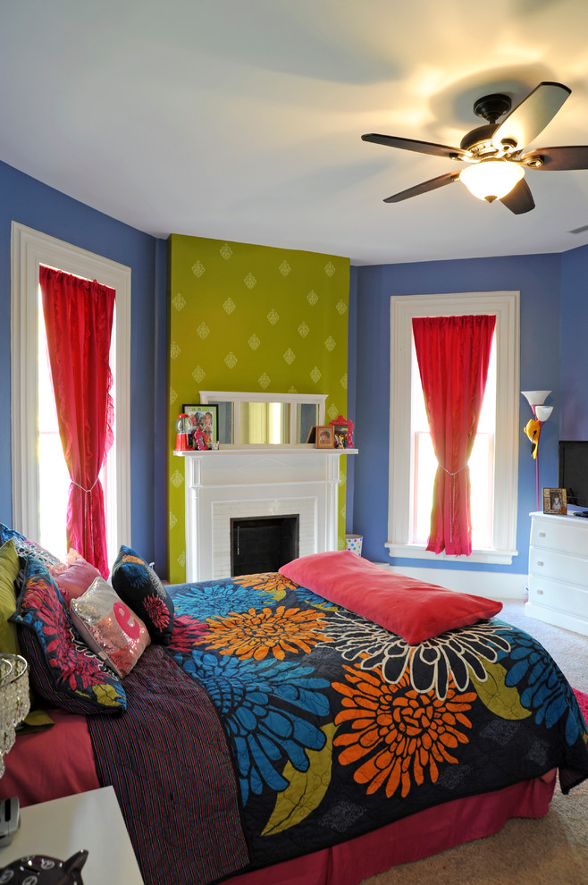 Inspiration for a large traditional teen’s room for girls in Other with blue walls and carpet.