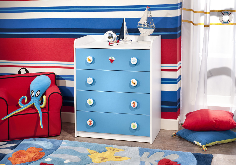 This is an example of a beach style gender neutral kids' bedroom in Miami.