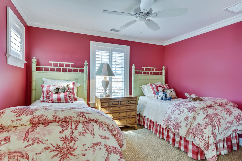 Design ideas for a medium sized nautical gender neutral teen’s room in New York with red walls, carpet and beige floors.