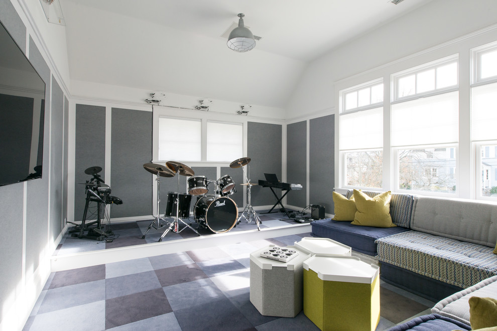 Inredning av ett modernt tonårsrum kombinerat med lekrum, med grå väggar, heltäckningsmatta och blått golv