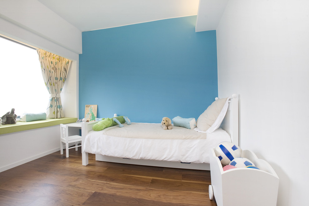 Inspiration for a contemporary kids' bedroom in Hong Kong with blue walls.