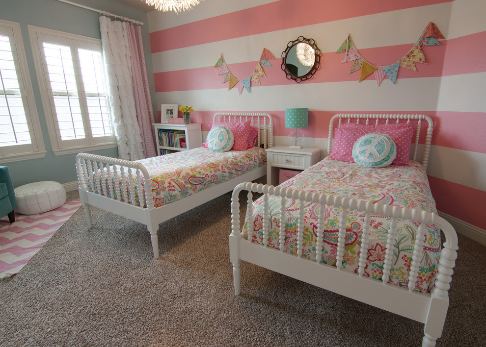 Kids' room - traditional girl carpeted kids' room idea in Dallas with multicolored walls