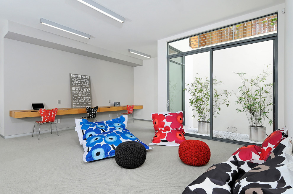 This is an example of a contemporary playroom in San Francisco with grey floors.