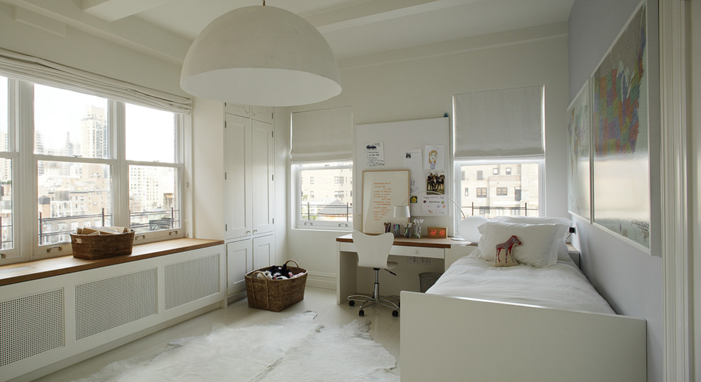 This is an example of a modern gender neutral children’s room in New York with white walls.