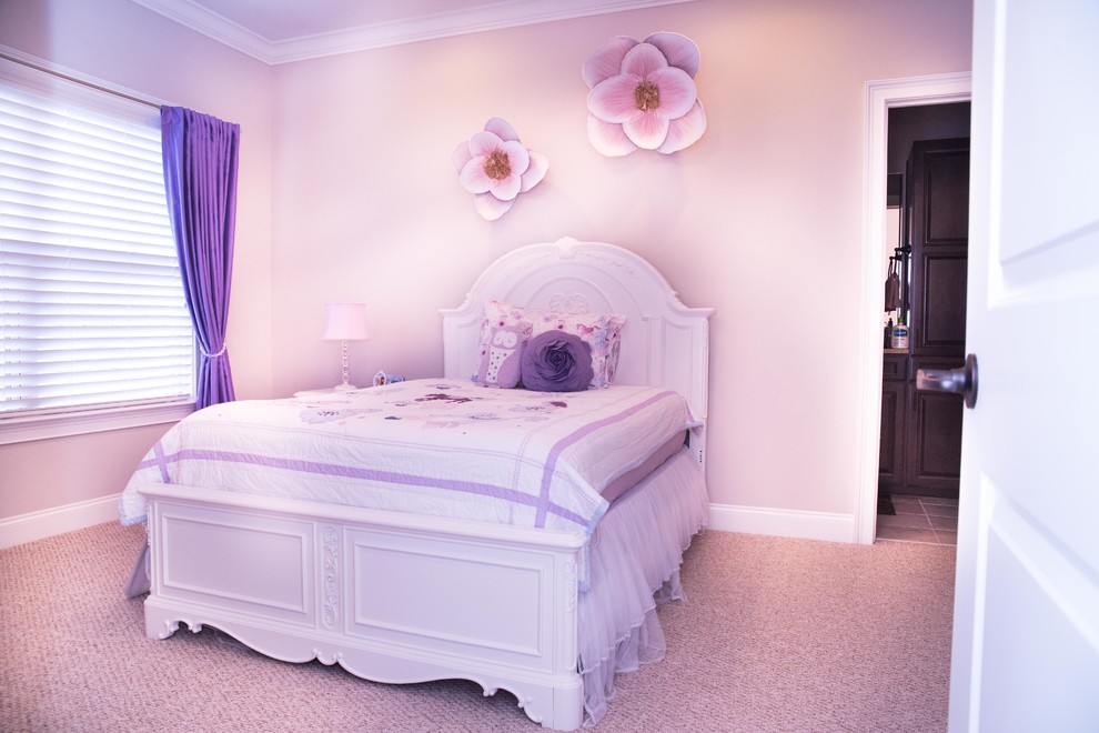 Medium sized shabby-chic style children’s room for girls in Atlanta with beige walls, carpet and beige floors.