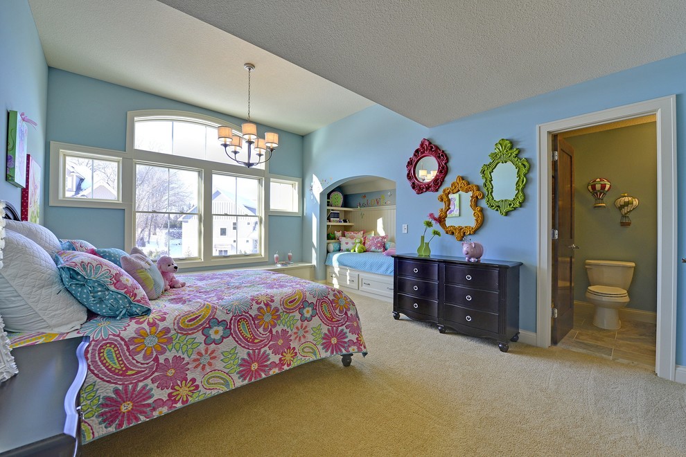 Trendy girl kids' room photo in Minneapolis with blue walls