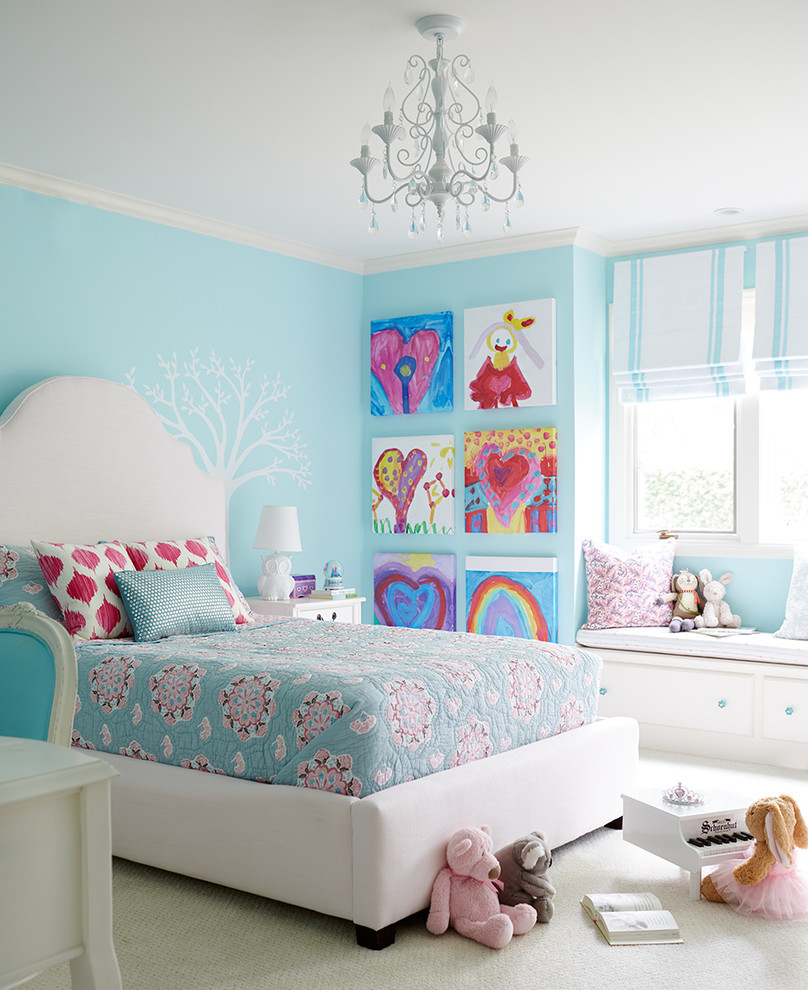 Inspiration for a timeless girl carpeted and beige floor kids' room remodel in San Francisco with blue walls