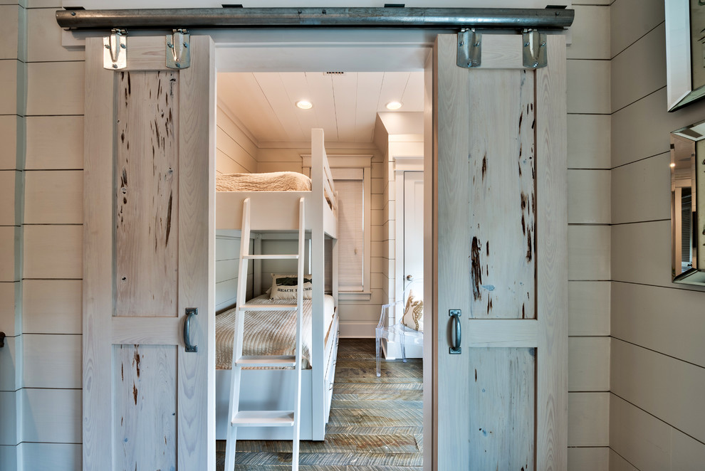 Inspiration for a nautical kids' bedroom in Miami with medium hardwood flooring.