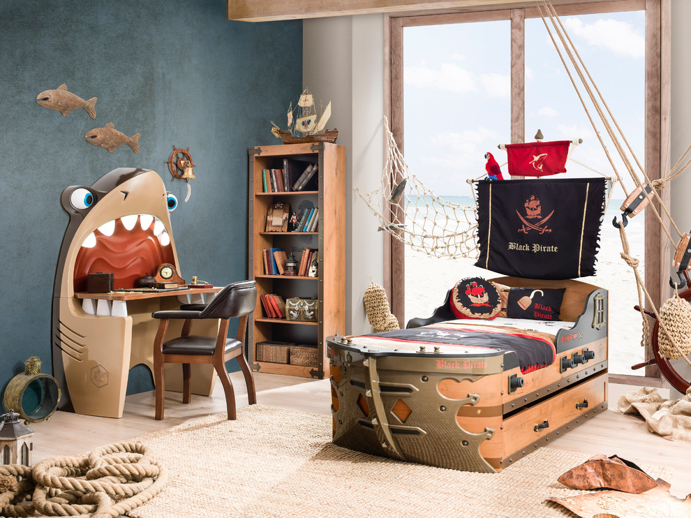 This is an example of a beach style kids' bedroom for boys in Miami.