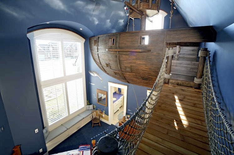 Inspiration for an eclectic gender-neutral carpeted kids' room remodel in Minneapolis with blue walls