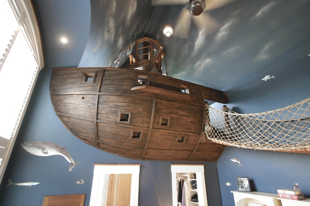 Eclectic gender-neutral carpeted kids' room photo in Minneapolis with blue walls
