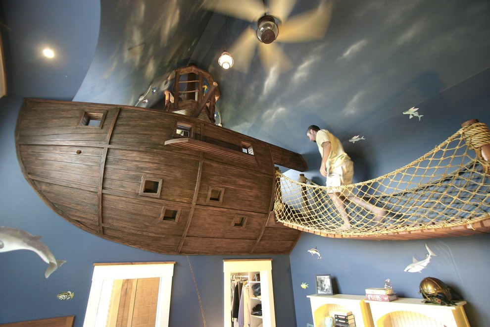 Kids' room - eclectic gender-neutral carpeted kids' room idea in Minneapolis with blue walls