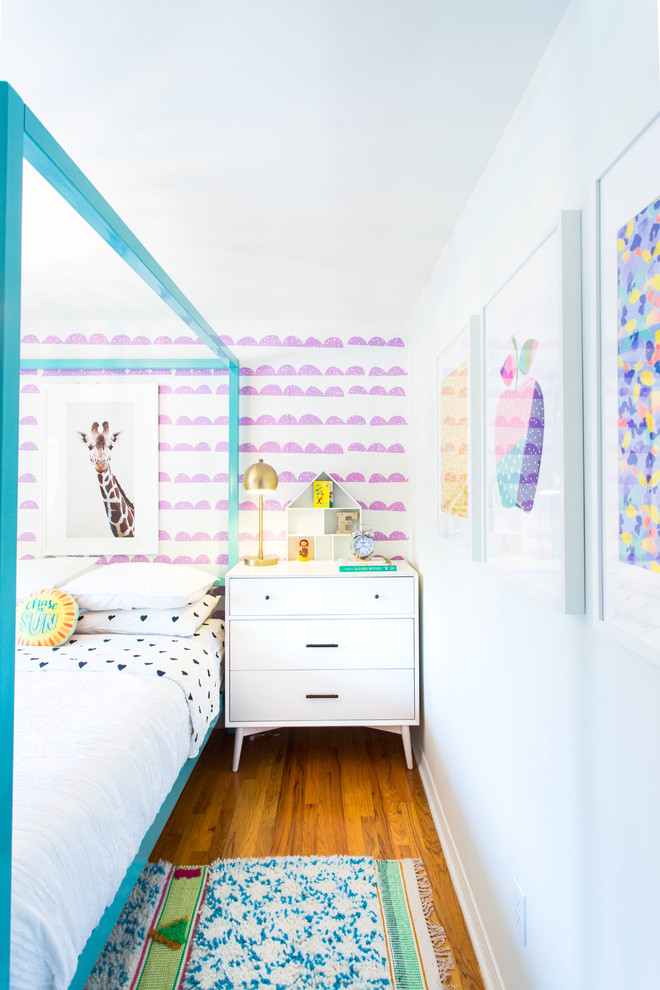 This is an example of a shabby-chic style kids' bedroom in Denver.