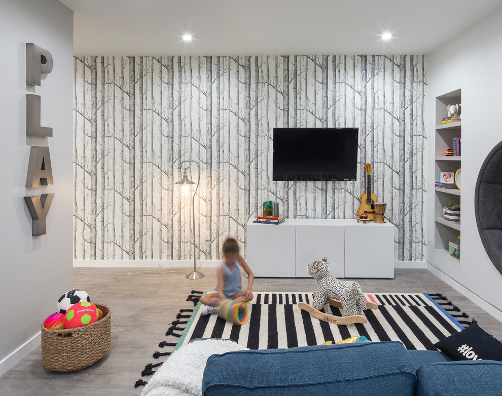 Ispirazione per una grande cameretta per bambini da 4 a 10 anni design con pareti bianche, pavimento in gres porcellanato e pavimento grigio