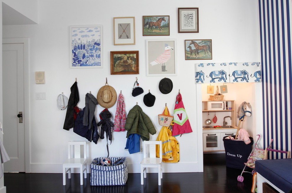 Large transitional gender-neutral dark wood floor kids' room photo in Los Angeles with white walls