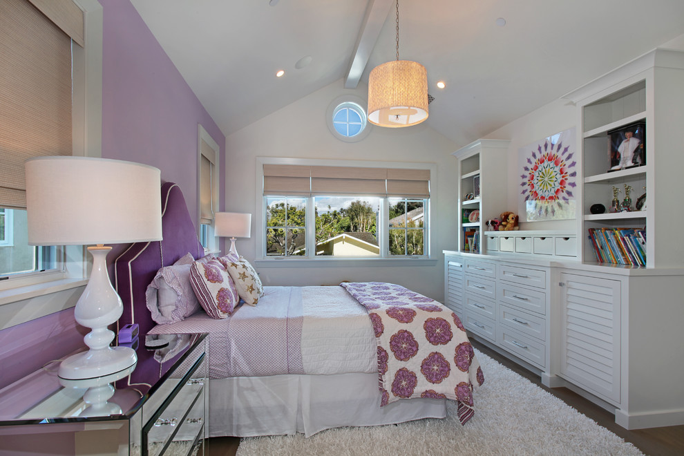 Inspiration for a traditional teen’s room for girls in Orange County with purple walls and dark hardwood flooring.