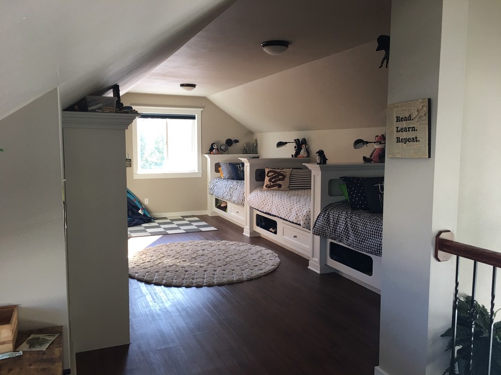Design ideas for a medium sized traditional kids' bedroom in Seattle with grey walls, laminate floors and brown floors.