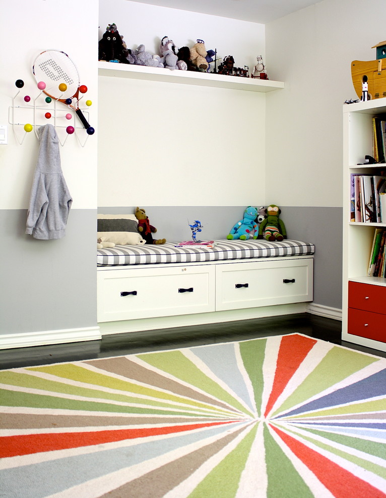 Photo of a traditional gender neutral playroom in Los Angeles with white walls.