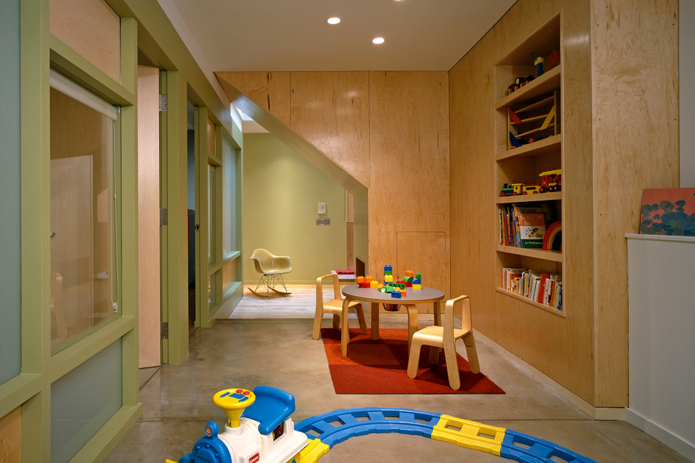 Modelo de dormitorio infantil moderno pequeño con paredes verdes y suelo de cemento