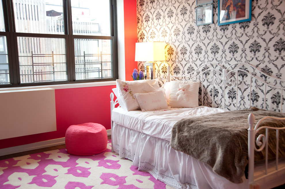 Mid-sized eclectic girl kids' room photo in New York with pink walls