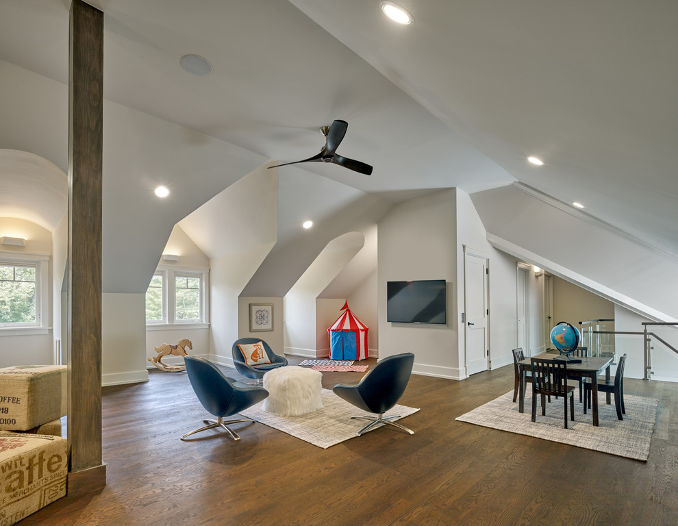 Example of a transitional gender-neutral dark wood floor and brown floor kids' room design in Other with gray walls
