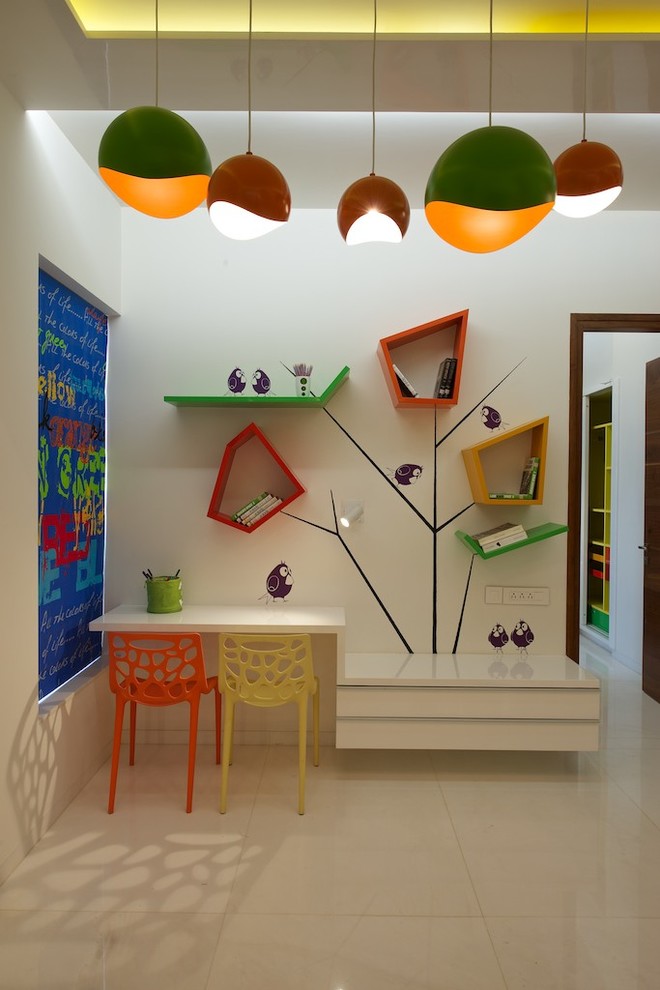 Inspiration for a contemporary gender-neutral kids' room remodel in Ahmedabad with white walls