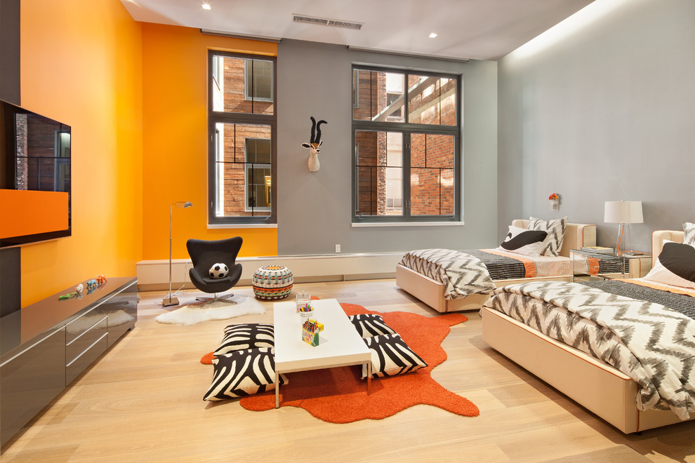 Example of a trendy kids' room design in Houston with gray walls