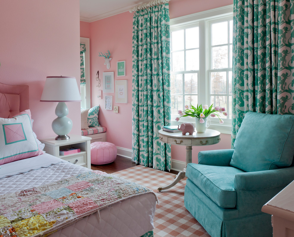 This is an example of a large classic children’s room for girls in Little Rock with pink walls and carpet.