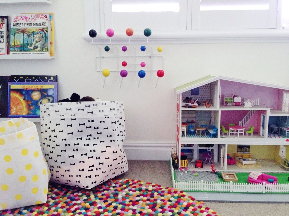 Kids' room - mid-sized modern girl carpeted kids' room idea in Sydney with white walls