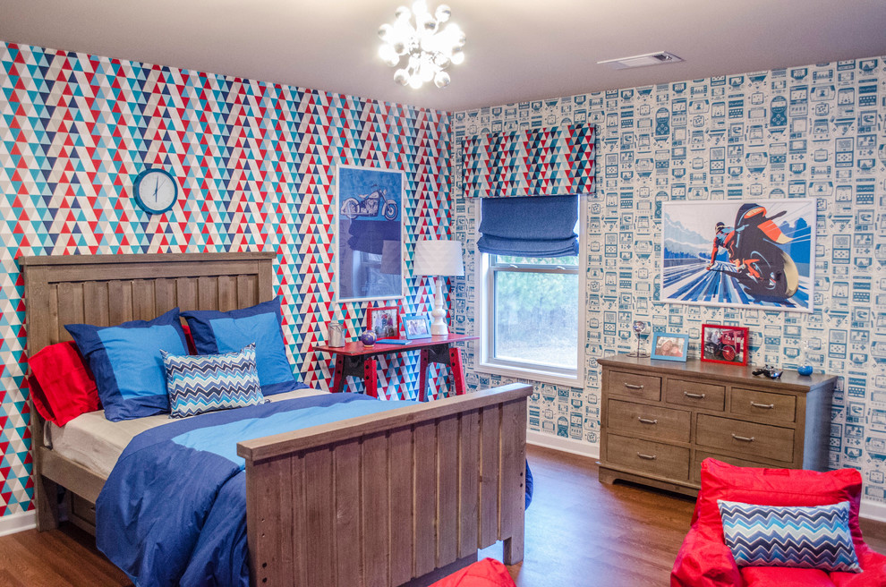 Idée de décoration pour une chambre d'enfant tradition avec un mur multicolore.
