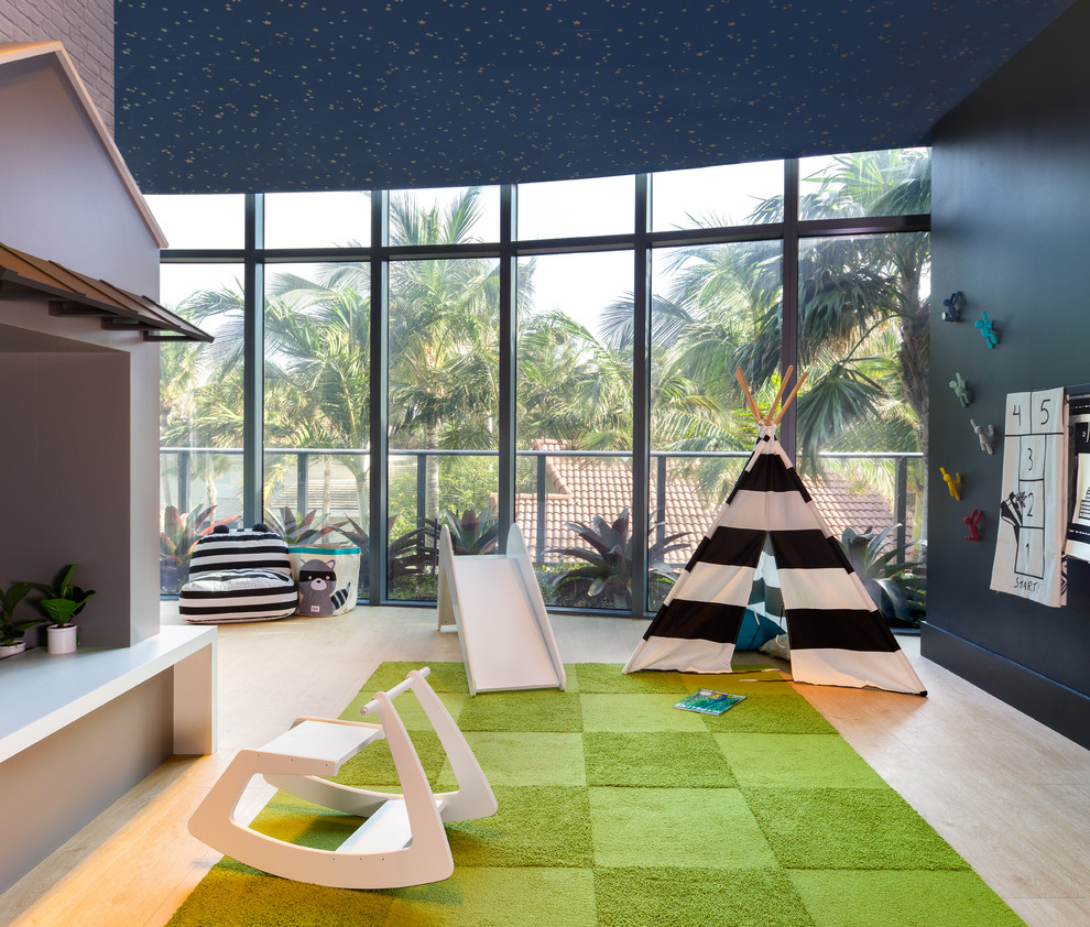 Trendy gender-neutral light wood floor and beige floor playroom photo in Miami with black walls