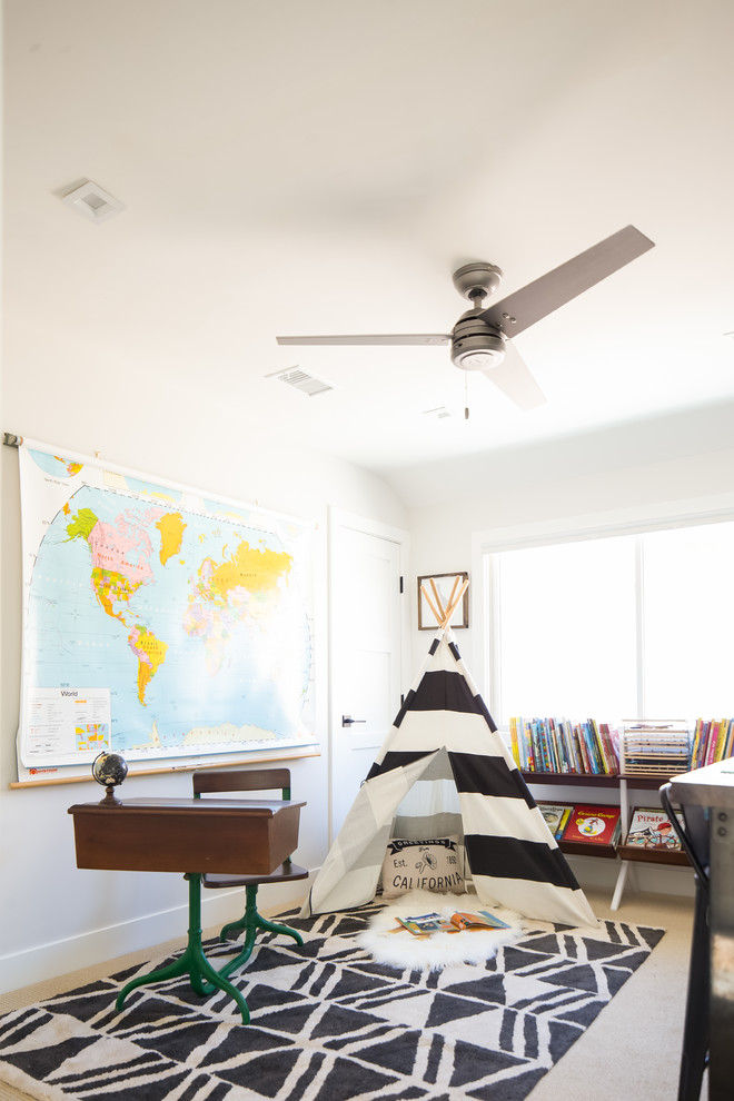 Design ideas for a coastal gender neutral kids' bedroom in Orange County with white walls, carpet and beige floors.