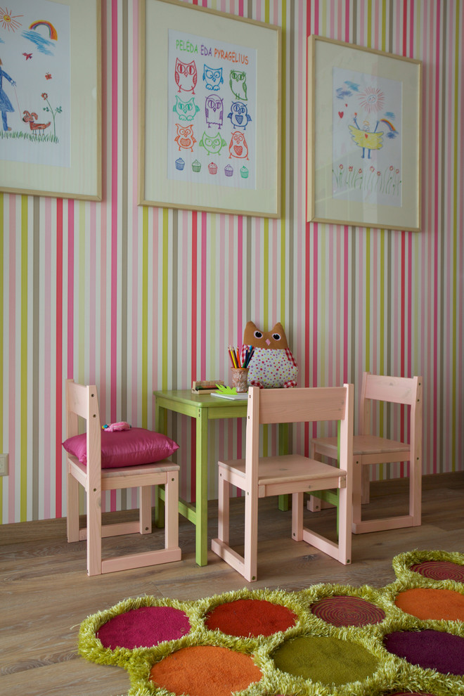 Kids' room - eclectic girl light wood floor kids' room idea
