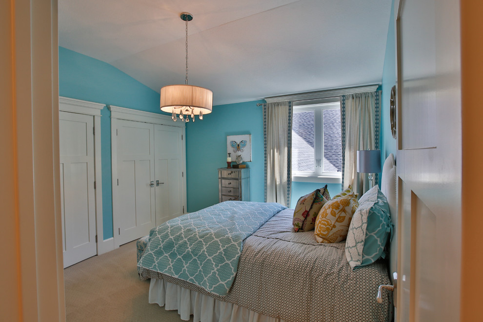 Inspiration for a large classic children’s room for girls in Salt Lake City with blue walls and carpet.