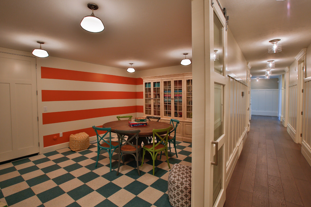 Large transitional gender-neutral medium tone wood floor kids' room photo in Salt Lake City with multicolored walls