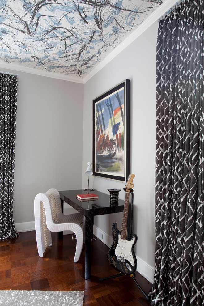 Teen room - contemporary boy dark wood floor teen room idea in Houston with gray walls