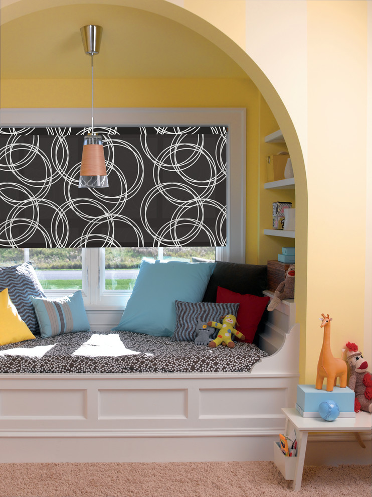 This is an example of a medium sized eclectic gender neutral children’s room in Charleston with yellow walls and carpet.