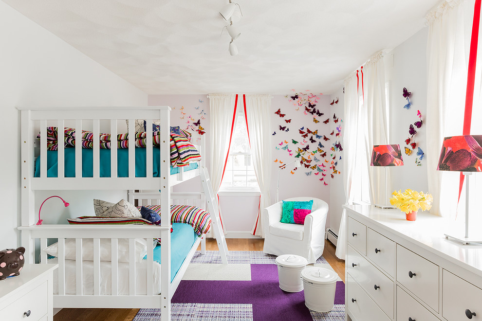 Example of a trendy girl kids' room design in Boston
