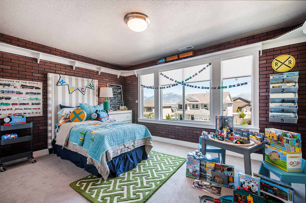 This is an example of a large contemporary toddler’s room for boys in Salt Lake City with carpet, multi-coloured walls and grey floors.
