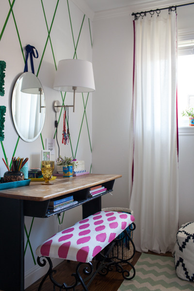 Inspiration for a small bohemian teen’s room for girls in San Francisco with white walls and dark hardwood flooring.